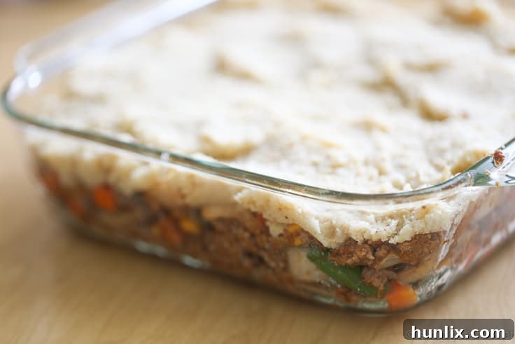 Healthy Shepherd's Pie - A comfort food classic recipe gets a makeover. This Healthy Shepherd's Pie has a mashed cauliflower topping and fibre filled filling. Delish!
