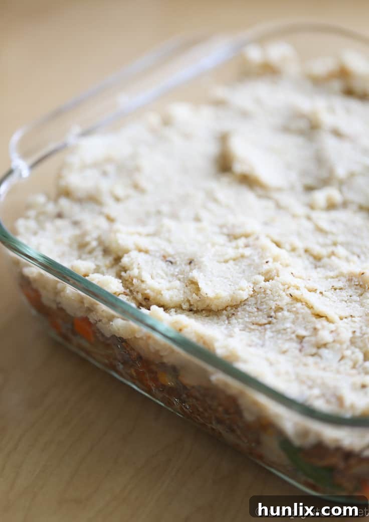 Healthy Shepherd's Pie - A comfort food classic recipe gets a makeover. This Healthy Shepherd's Pie has a mashed cauliflower topping and fibre filled filling. Delish!