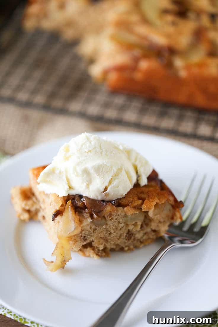 Caramelized Apple Inverted Delight 18 A warm, inviting shot of the Apple Upside Down Cake, ready to be served, showcasing its comforting appeal.