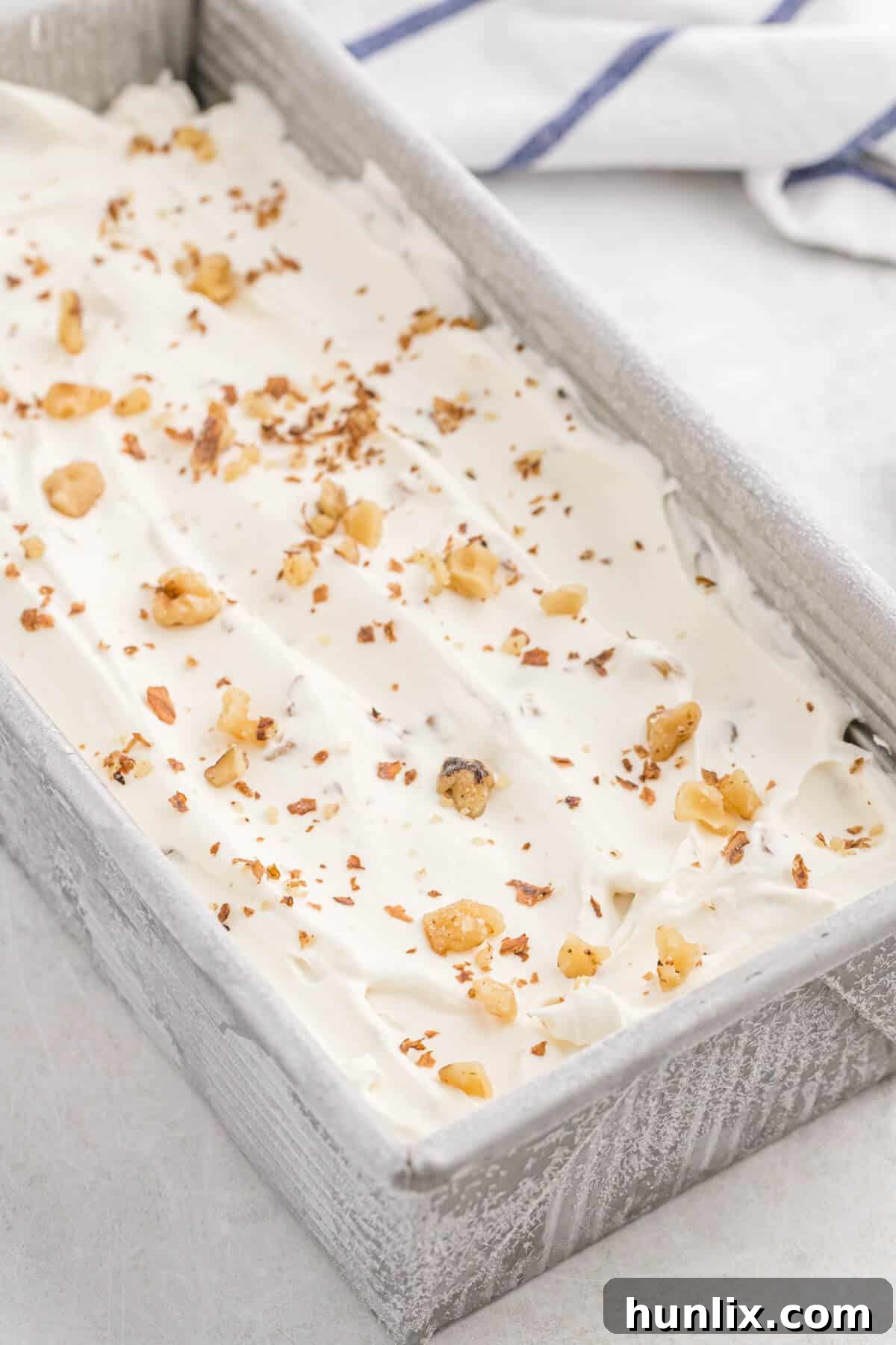 Maple walnut ice cream in a loaf pan.