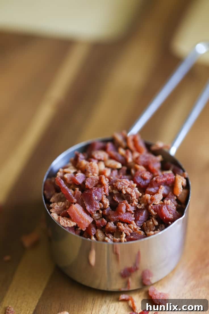 Precooked bacon bits, a quick and flavorful addition to the salad.
