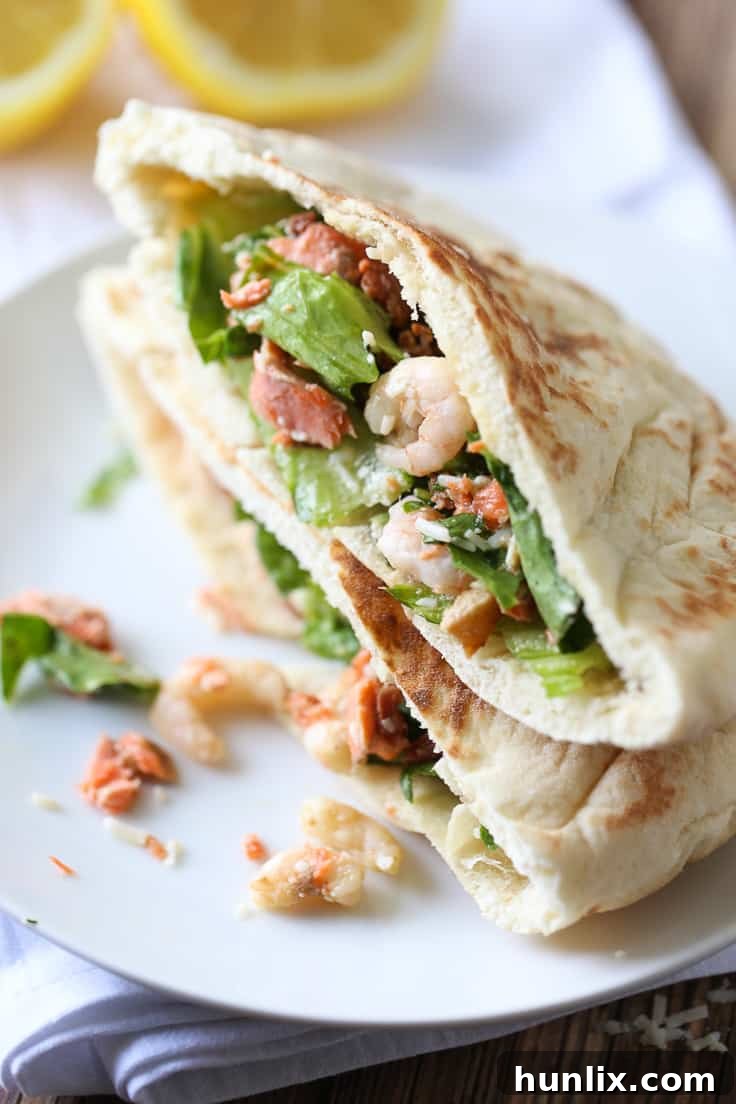 Seafood Caesar Salad artfully arranged for a stunning presentation.