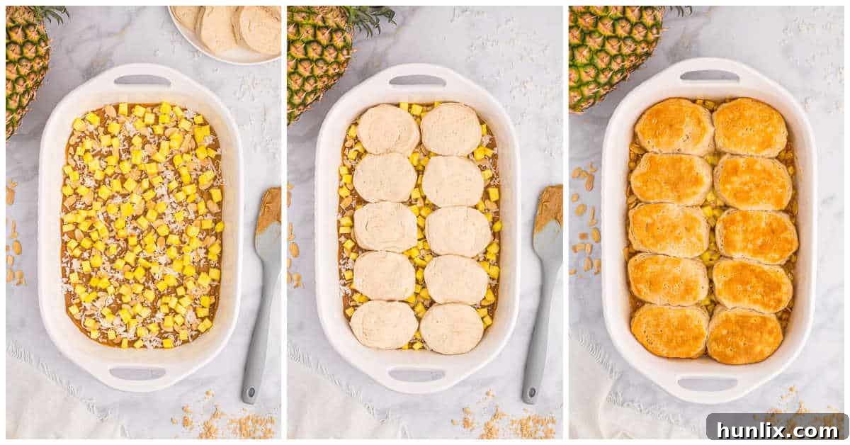 Pineapple Paradise Sticky Buns with Coconut Caramel Sauce 5 A close-up shot of refrigerated biscuits arranged in a single layer over the fruit and caramel mixture in a baking dish, illustrating the final preparation step before baking pineapple sticky buns.