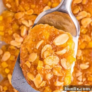 Pineapple Paradise Sticky Buns with Coconut Caramel Sauce 10 Pineapple sticky buns on a spatula.