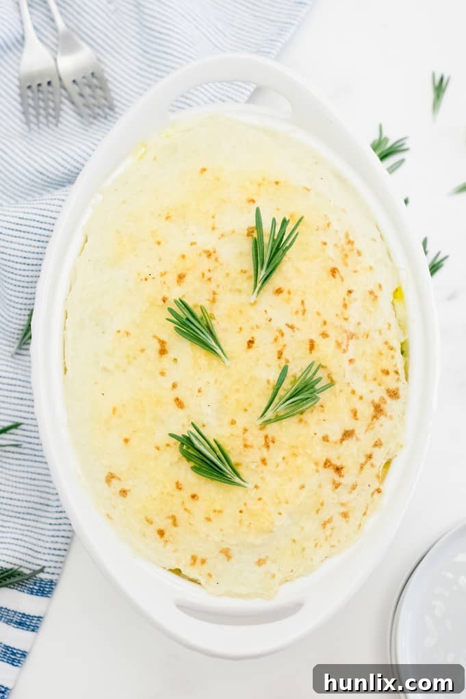 Chicken Shepherd's Pie in a white casserole dish.