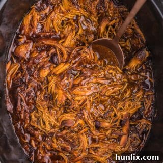 Slow Cooker Cranberry Chicken - Tender chicken breasts slow cooked with a sweet & savoury cranberry sauce flavoured with ginger and allspice.