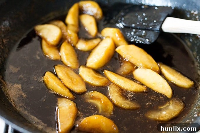 A stack of freshly made Apple Pie Pancakes ready to be served.