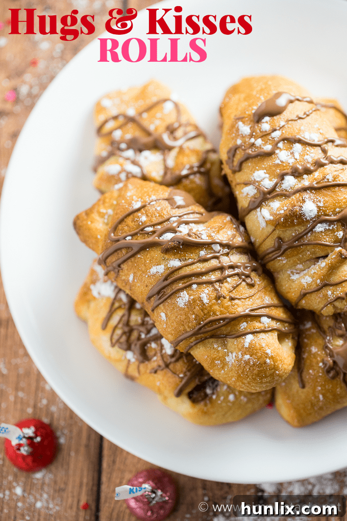 Sweet Hugs and Kisses Rolls 4 Hugs & Kisses Rolls - Imagine melted Hershey's Hugs and Hershey's Kisses tucked inside a warm crescent roll. Add a little powdered sugar and chocolate drizzle and you have yourself a heavenly treat! The perfect indulgence.