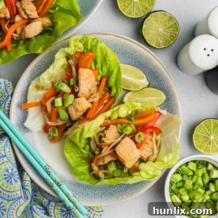 Asian chicken lettuce wraps on a plate.