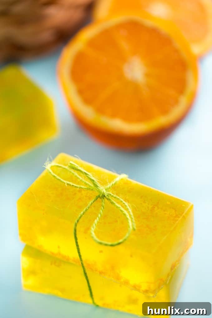 Zesty Sunshine Soap 3 Close-up of Orange Zest Soap bar, showing natural texture and color from fresh orange zest. Highlights the natural beauty of DIY soap.