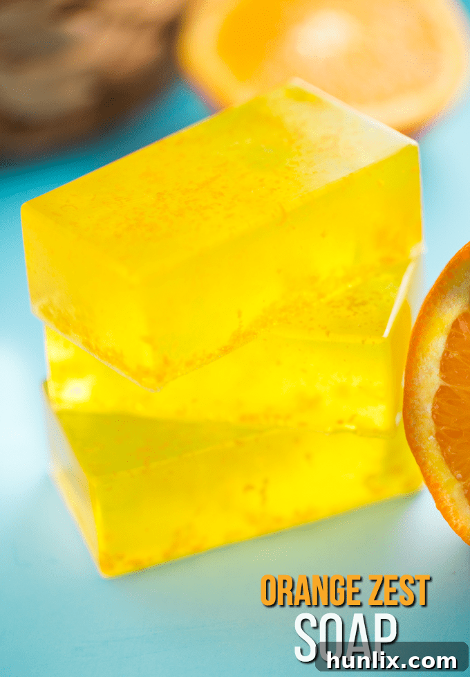 Zesty Sunshine Soap 4 Orange Zest Soap bars in a stack, ready for use or gifting. Emphasizes the ease of making refreshing DIY glycerine soap.