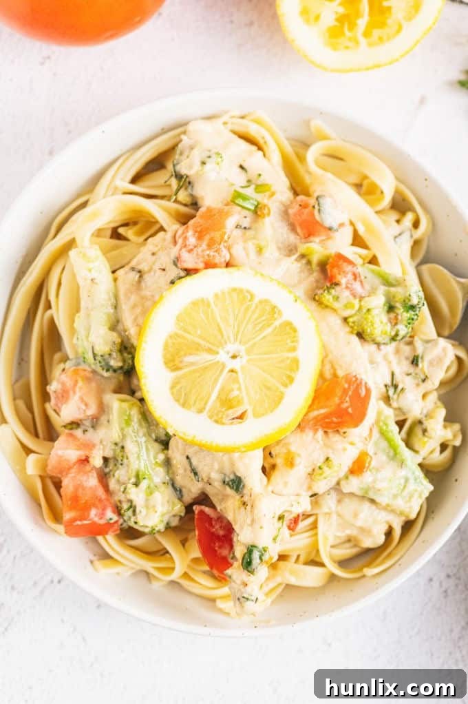 Zesty Lemon Herb Chicken Fettuccine 7 Cooking green onions, garlic, and oregano in a skillet for the creamy sauce
