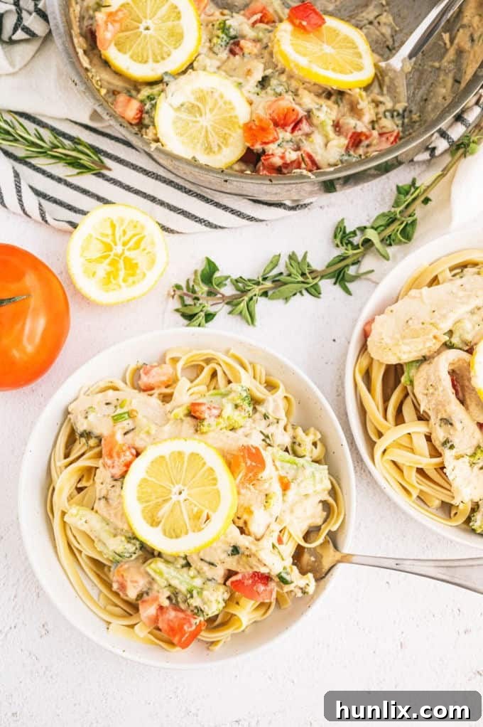Zesty Lemon Herb Chicken Fettuccine 9 Table setting with Lemon & Herb Chicken Fettuccine and side dishes