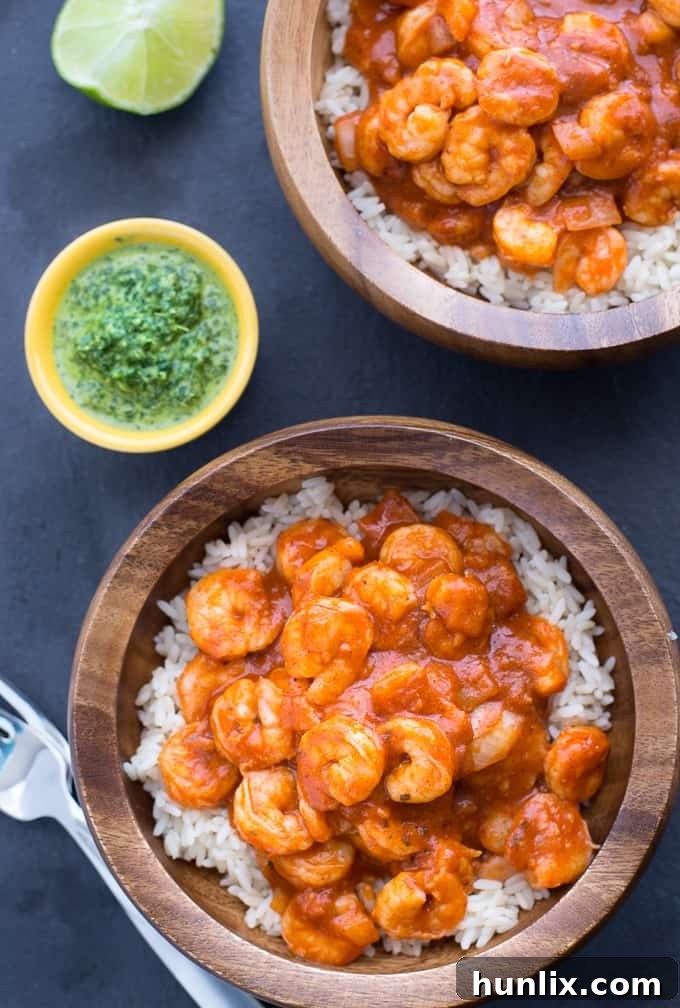 Close-up of Tandoori Shrimp and Mint Chutney on a plate, highlighting the vibrant colors and fresh herbs.