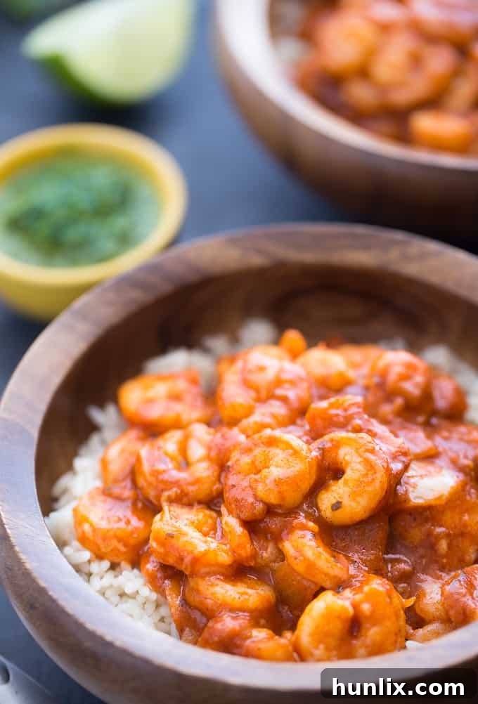 Fresh mint chutney in a small bowl, showcasing its bright green color and herbaceous texture.