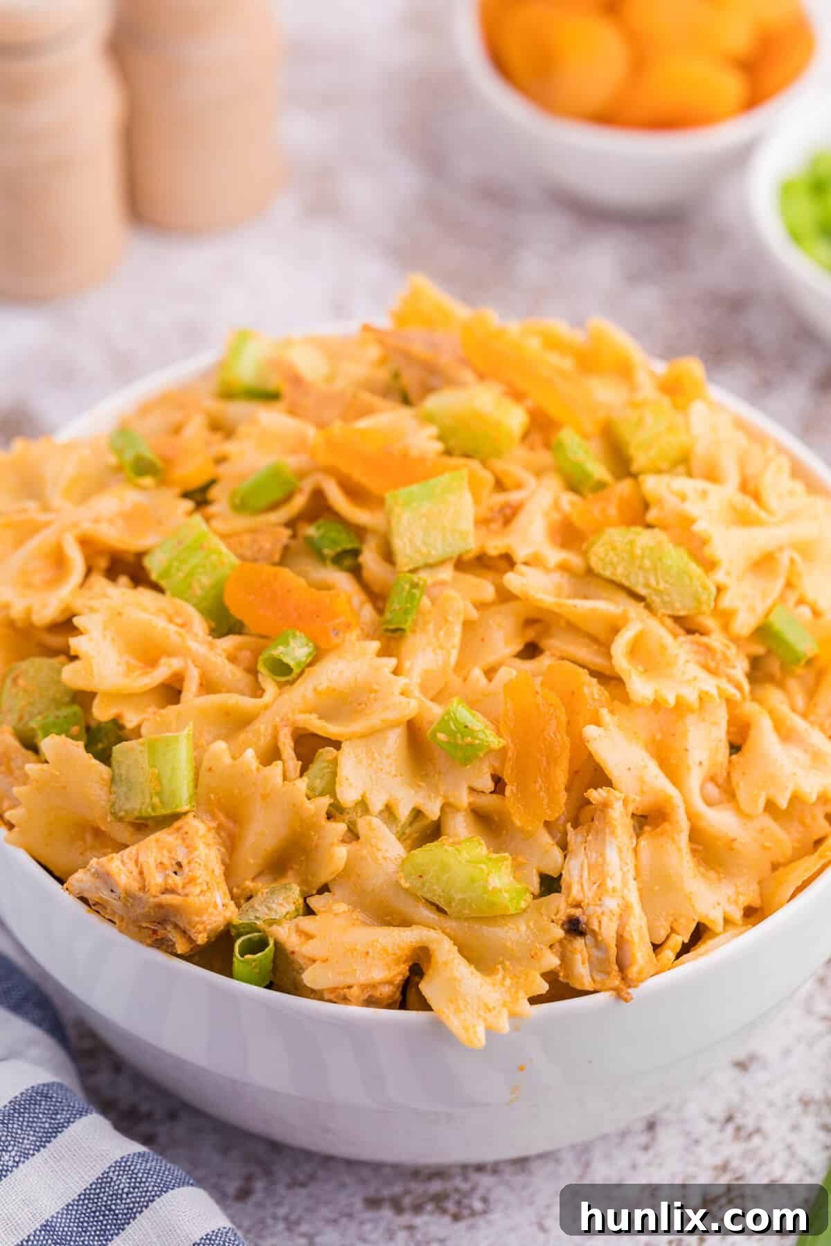Golden Curry Chicken Pasta Salad 4 A close-up of creamy curried chicken pasta salad, ready to be served.
