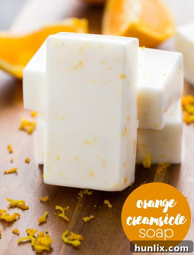 Creamy Orange Bliss Soap 4 Ingredients laid out for making homemade Orange Creamsicle Soap, highlighting natural components.