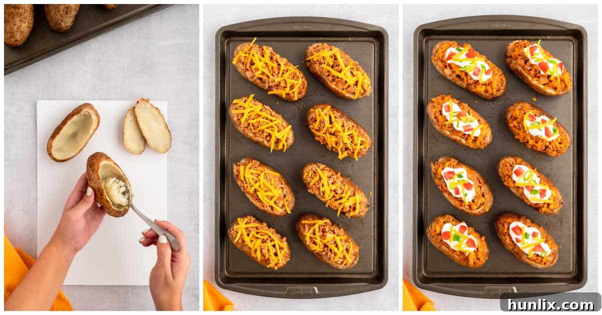 Three chicken taco twice-baked potatoes filled with chicken and cheese on a baking sheet.