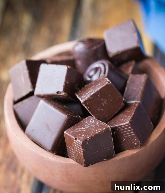 A vibrant display of fresh cocoa pods and rich Saint Lucian chocolate, symbolizing the island's deep heritage and exquisite flavors.