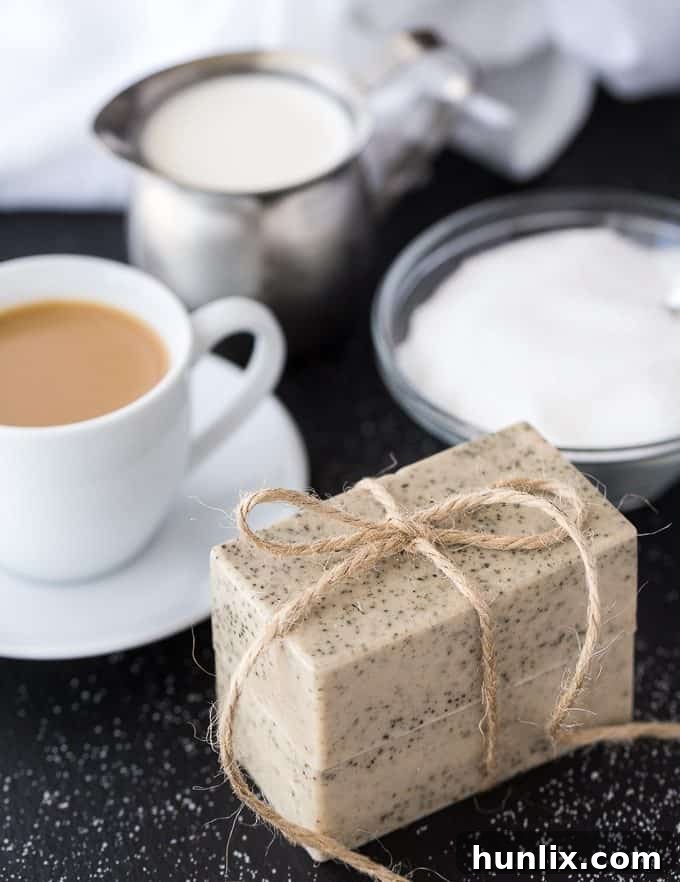 Homemade Vanilla Coffee Soap featuring rich coffee flecks for natural exfoliation and a comforting aroma, made using melt and pour technique.