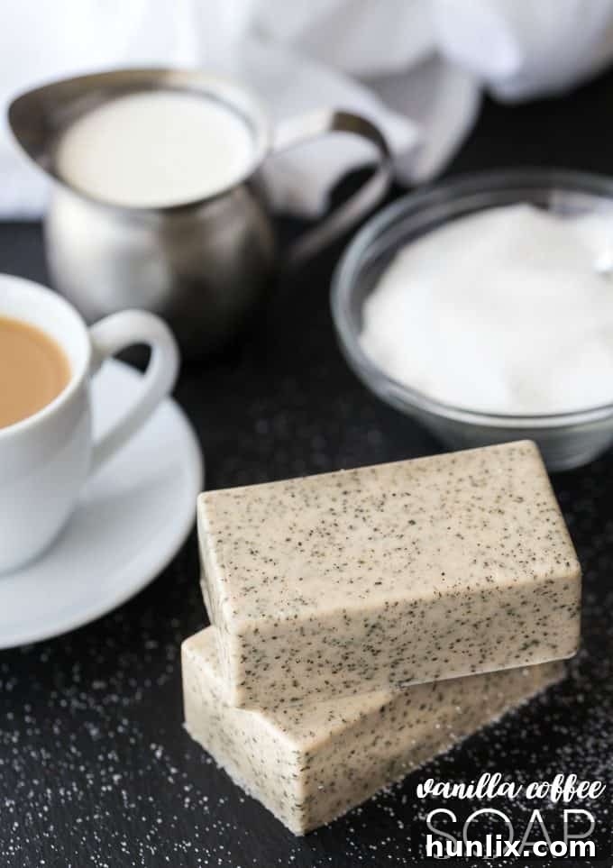 A close-up of a bar of Vanilla Coffee Soap, showcasing its rich texture and natural exfoliating coffee grounds.