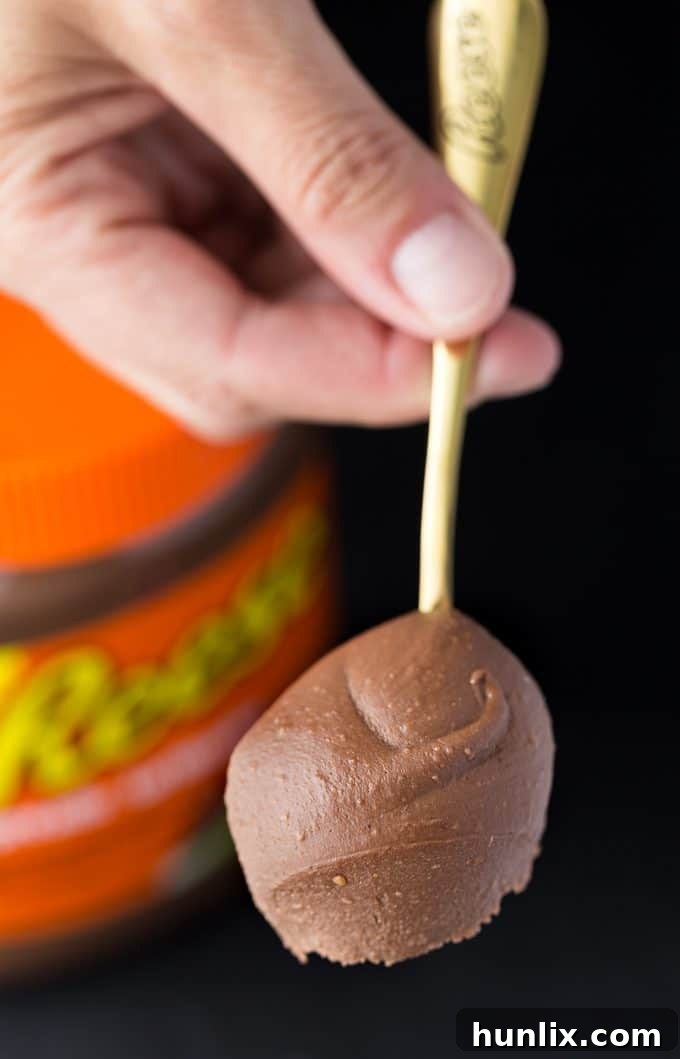 Decadent Reese Cheesecake with a rich chocolate peanut butter flavor profile.