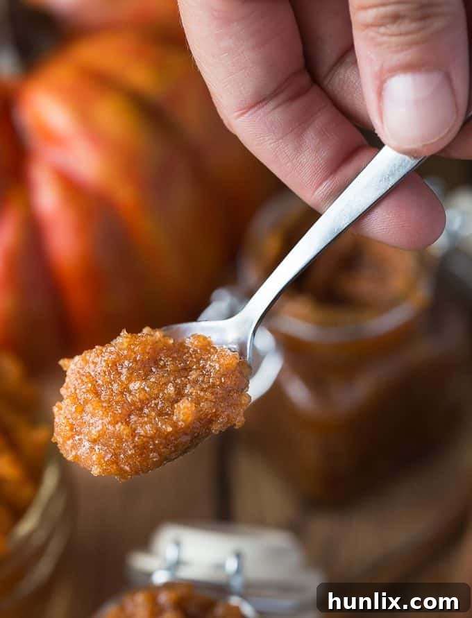 Melted coconut oil being poured for the Vanilla Pumpkin Sugar Scrub. A key moisturizing ingredient.