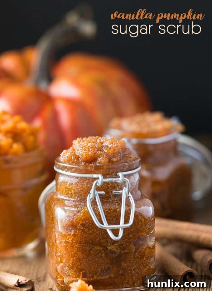 Ingredients laid out for Vanilla Pumpkin Sugar Scrub, including pumpkin puree, sugar, coconut oil, vanilla, and pumpkin spice.