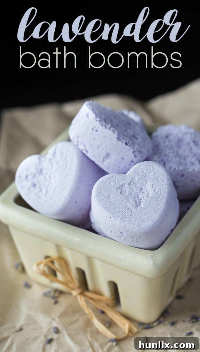 Calming Lavender Bath Fizzers 3 Close-up of a heart-shaped lavender bath bomb, highlighting its texture and color.