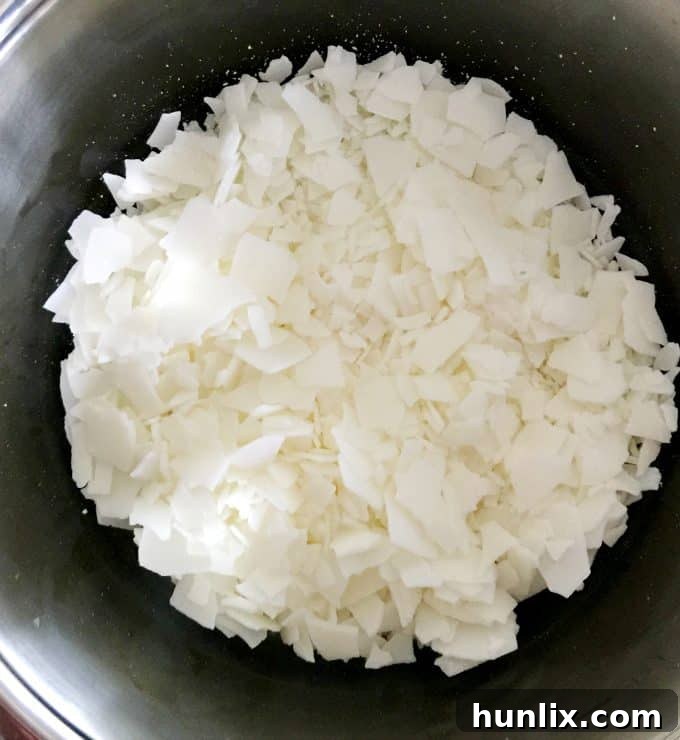 Crafting Layered Jar Candles 4 Melting soy wax flakes in a double boiler for candle making.