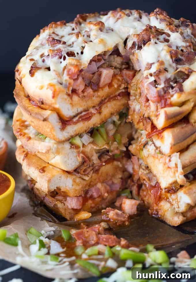 The Ultimate Pizza Stack 13 Pizza Cake - A pizza lover's dream! Every layer is a different flavor for when you can't decide between Meat Lovers and Canadian.