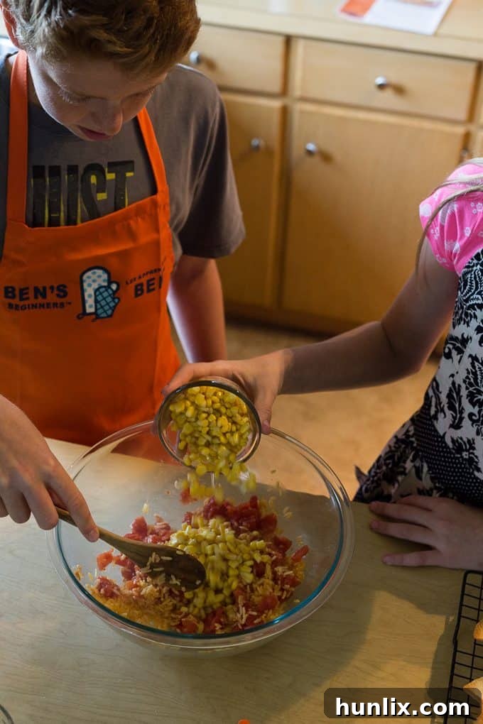 The delicious mixture of black beans, corn, rice, and tomatoes, ready to fill the taco bowls.