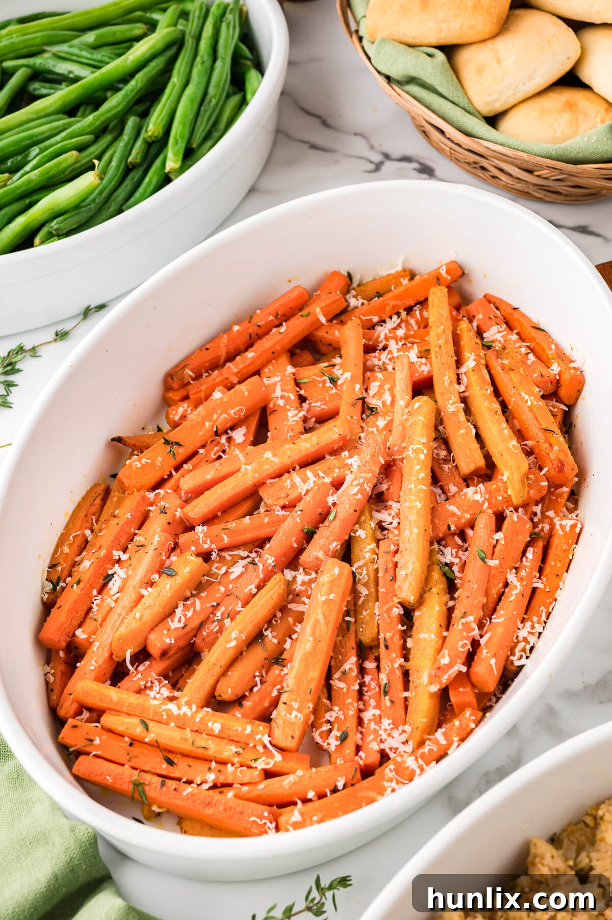 Parmesan roasted carrots in a casserole dish.