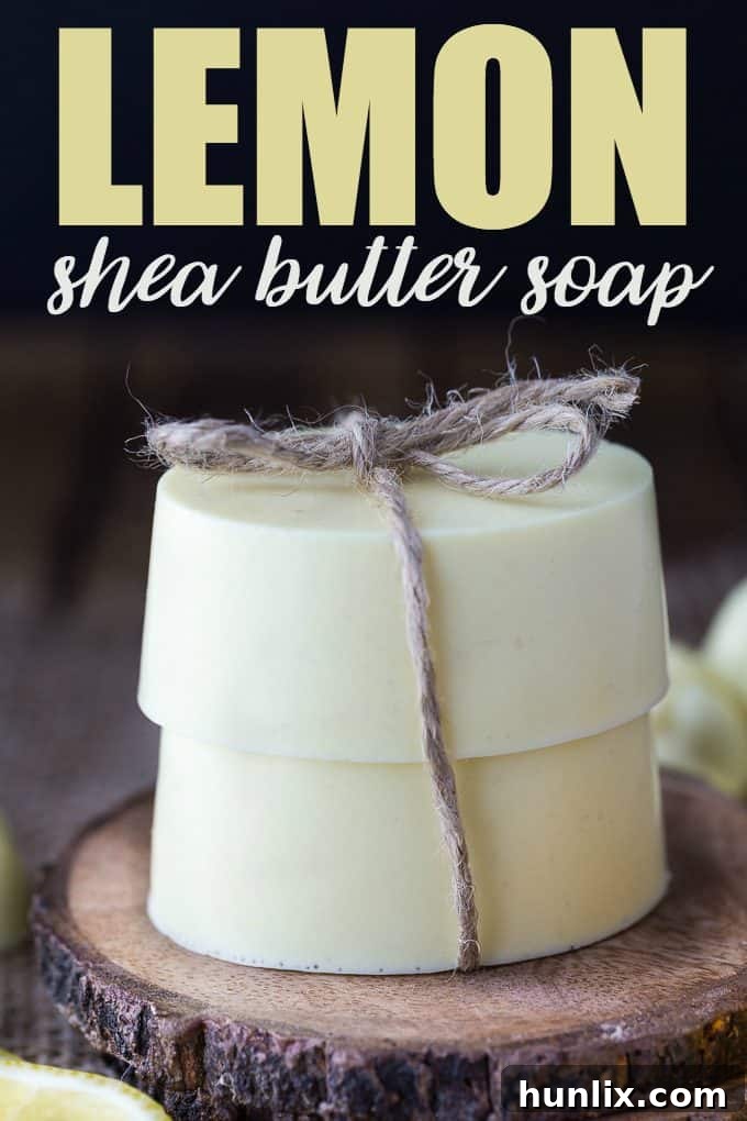 Zesty Lemon Shea Butter Bar 3 Lemon Shea Butter Soap bars stacked neatly, highlighting their smooth texture and vibrant yellow color, ideal for a homemade gift.