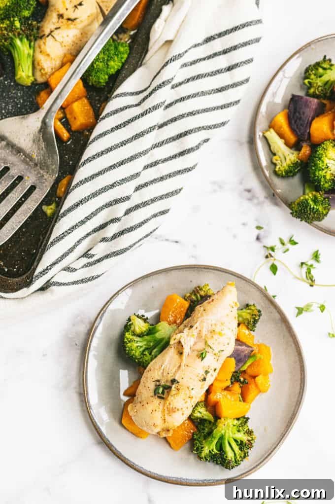 A perfectly portioned serving of One-Pan Maple Dijon Chicken and mixed roasted vegetables.