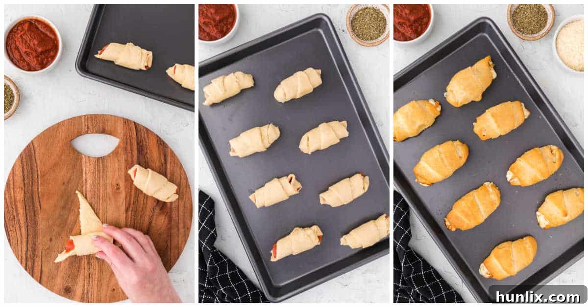 Two rows of uncooked pizza rolls neatly arranged on an ungreased baking sheet, ready for the oven.