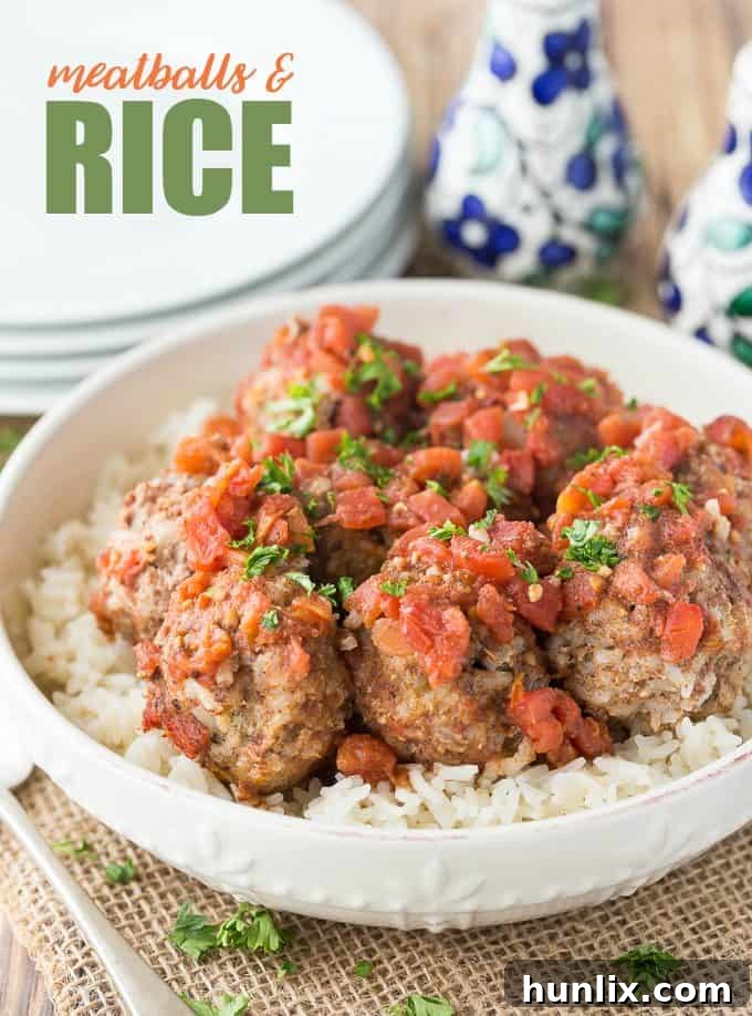 Close-up of baked meatballs with a rich spiced tomato sauce, highlighting the texture and inviting aroma.