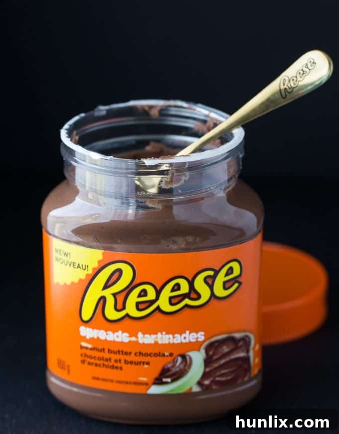 REESE Pie - This decadent no-bake dessert is all about REESE! It has a thick rich layer of REESE Spreads followed by a layer of REESE Peanut Butter Cups. Top that with a creamy, smooth chocolate/peanut butter pudding layer and a REESE'S Pieces colourful finish. 