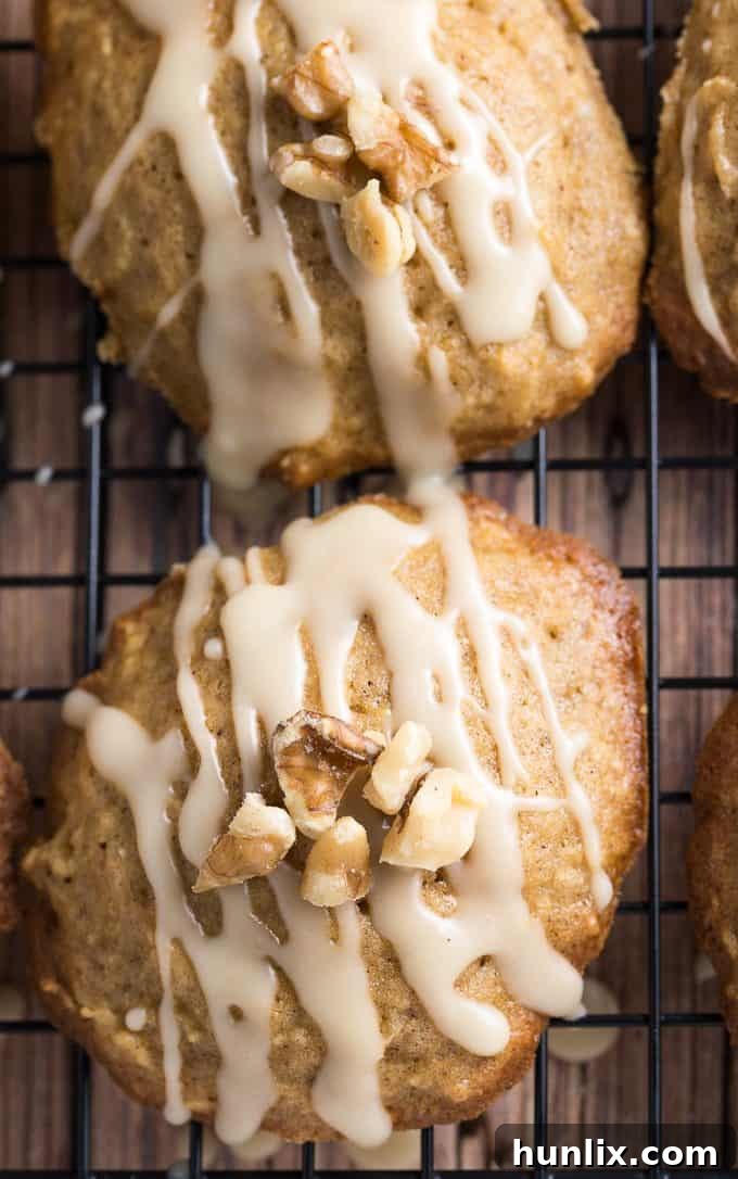Freshly baked Caramel Apple Cookies with a sweet caramel drizzle and optional walnut topping, a perfect fall treat.
