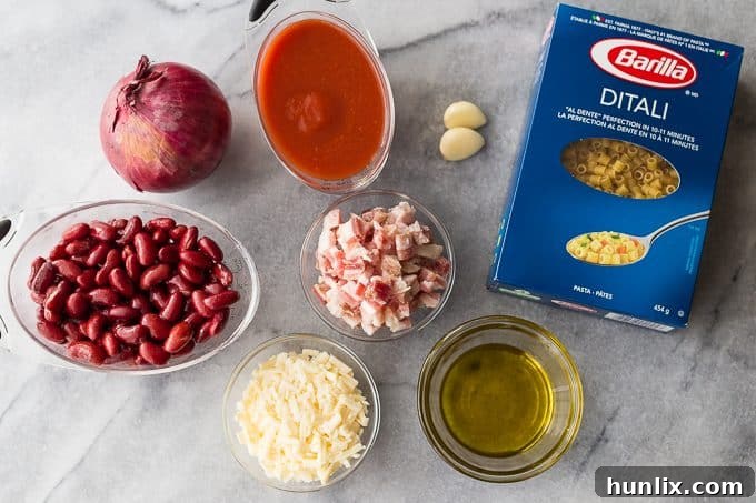 Pasta e Fagioli - Hearty and filling! This creamy pasta with beans will practically melt in your mouth. 