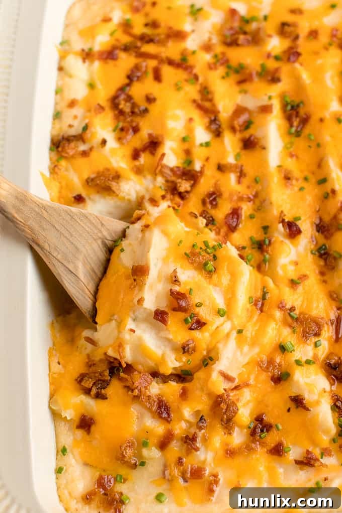 The recipe in a pan with a wooden spoon.