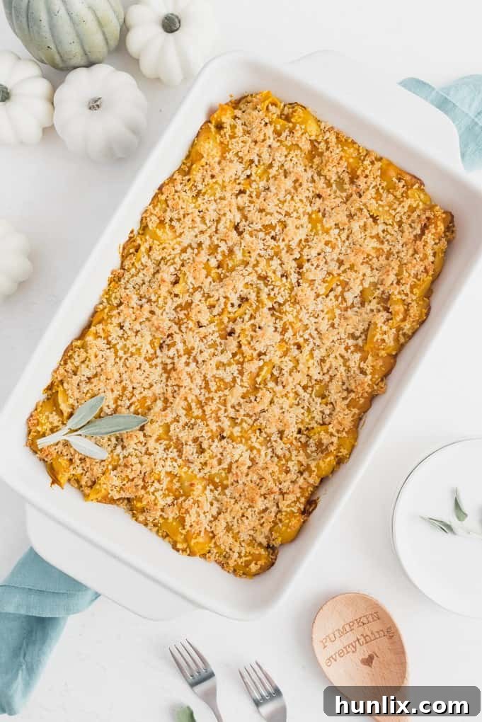 Golden Harvest Mac and Cheese 4 Ingredients for Pumpkin Macaroni & Cheese, including pumpkin puree, cheese, and pasta.