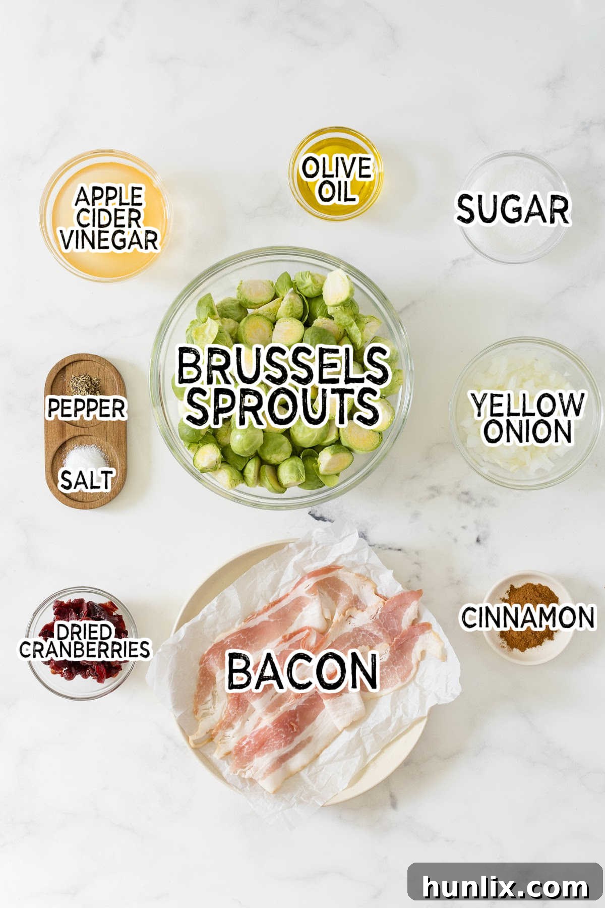 Crispy Bacon Cranberry Roasted Brussels 3 Assortment of fresh ingredients laid out to make roasted brussel sprouts with cranberries and bacon.