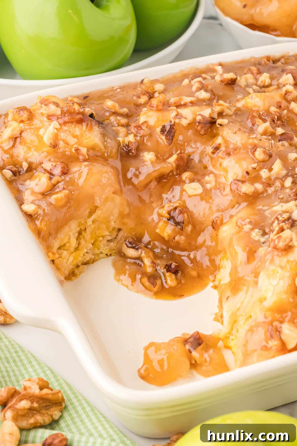 The baking pan with Apple Butterscotch Buns, some portions already removed, highlighting the delicious, sticky leftovers.