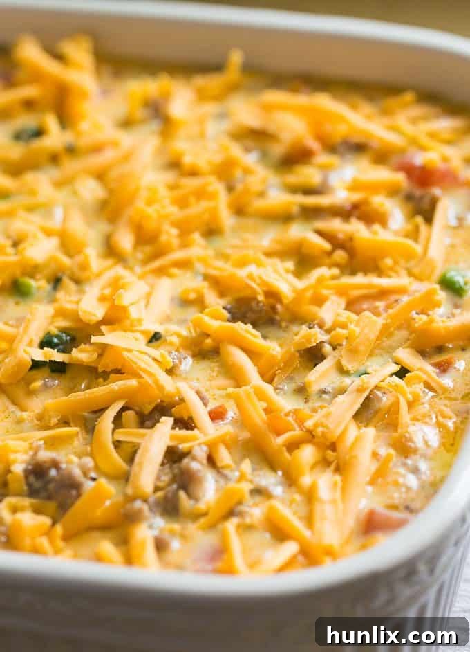 Sausage & Butternut Squash Breakfast Casserole - A delicious, hearty and easy breakfast casserole recipe perfect to serve to your holiday guests!