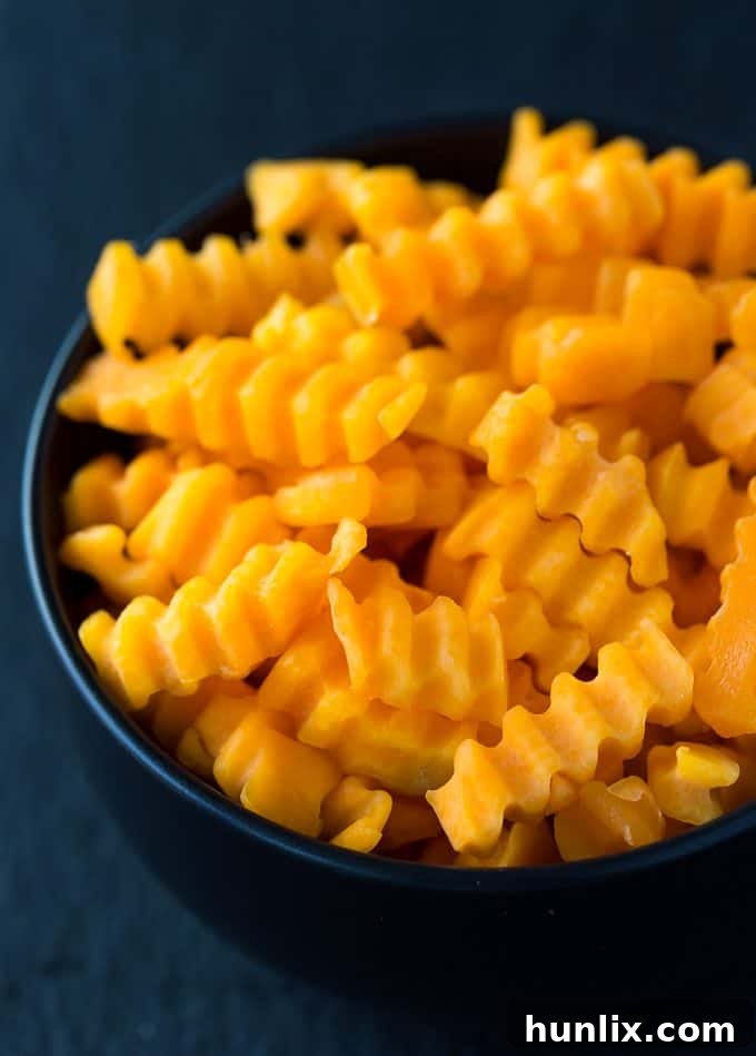 Sausage & Butternut Squash Breakfast Casserole - A delicious, hearty and easy breakfast casserole recipe perfect to serve to your holiday guests!