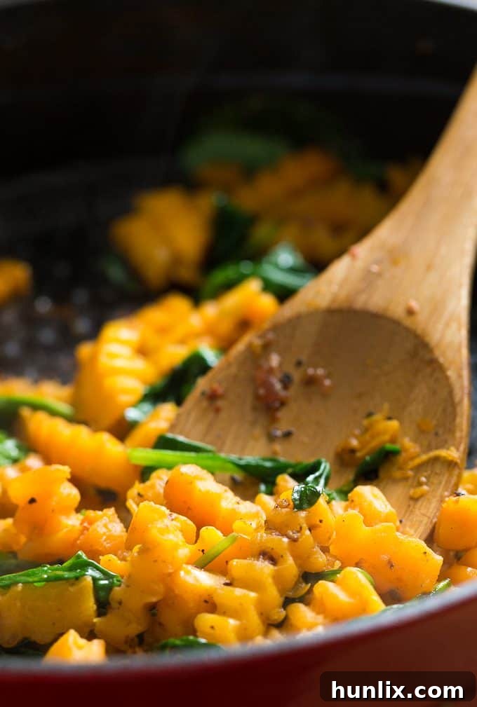 Sausage & Butternut Squash Breakfast Casserole - A delicious, hearty and easy breakfast casserole recipe perfect to serve to your holiday guests!