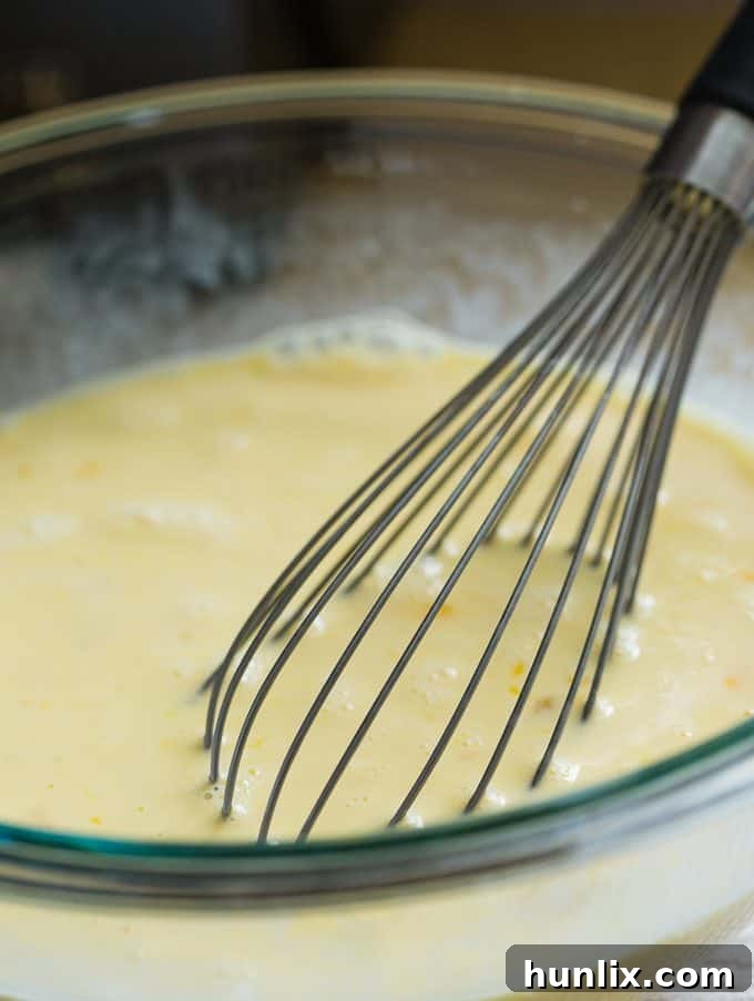 Sausage & Butternut Squash Breakfast Casserole - A delicious, hearty and easy breakfast casserole recipe perfect to serve to your holiday guests!