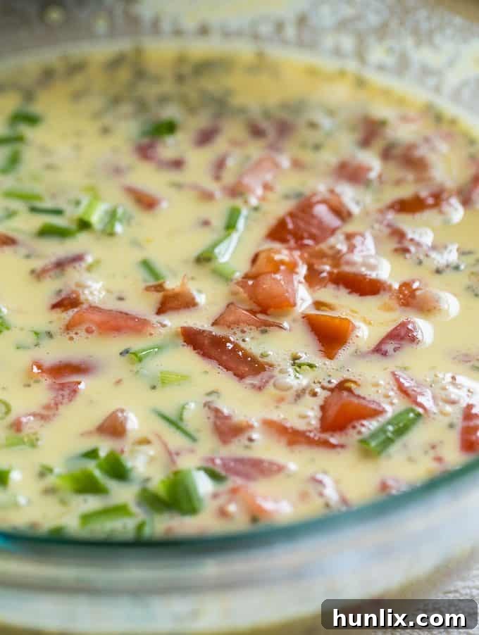 Sausage & Butternut Squash Breakfast Casserole - A delicious, hearty and easy breakfast casserole recipe perfect to serve to your holiday guests!