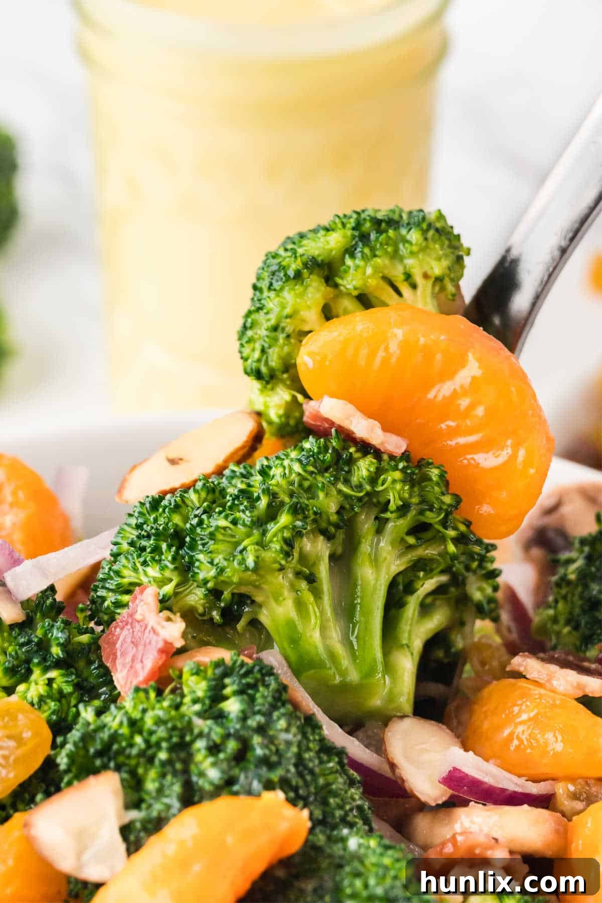 Creamy Broccoli Salad 8 A spoonful of broccoli salad, showing its textures.